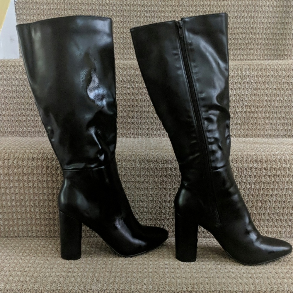 Tall high heel black boots